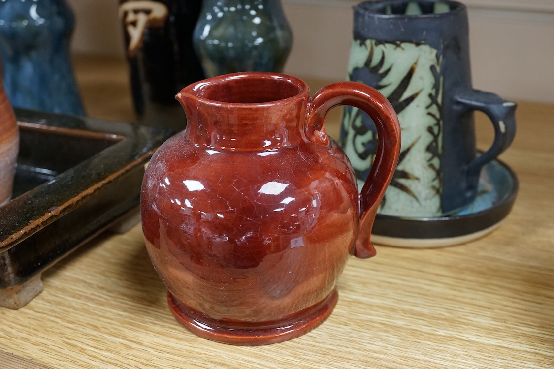 A collection of studio pottery to include a Celtic pottery Newlyn goblet, various jugs and bowls, largest 19cm high